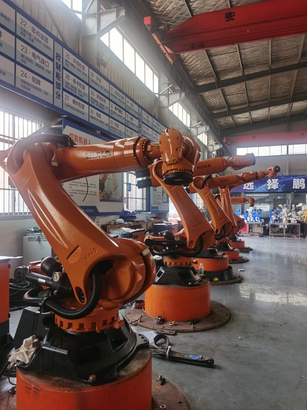 KUKA KR300 R2500 Ультра 300 кг полезная нагрузка 2500 мм Достижение Использованные роботы KUKA с повторяемостью ±0,1 мм И программирование Kuka Загрузка робота Обработка шлифования Фрезерная